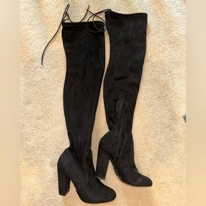 Over the knee black heeled boots